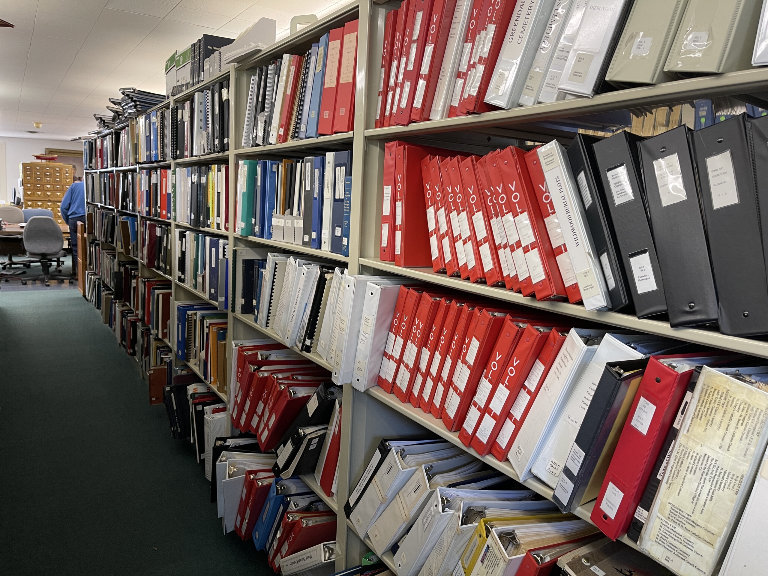 row of 3 ring binders in library